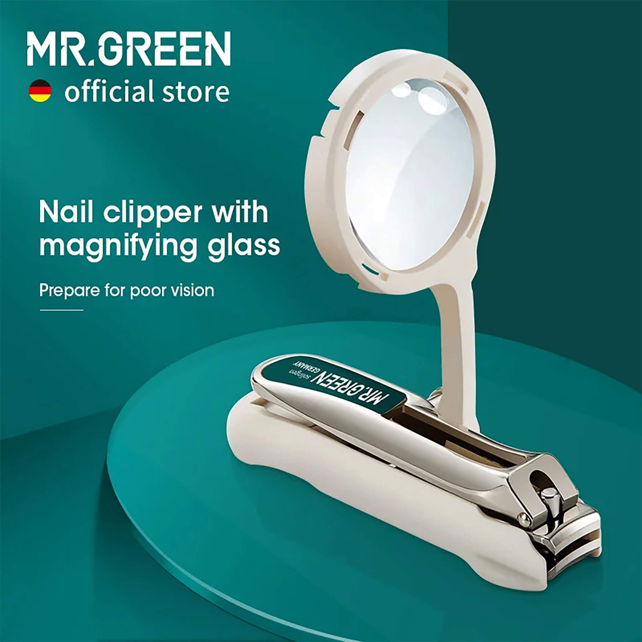 MR.GREEN nail clipper with 2x magnifying glass and anti-splash catcher on teal, safe trimming for low-vision users.