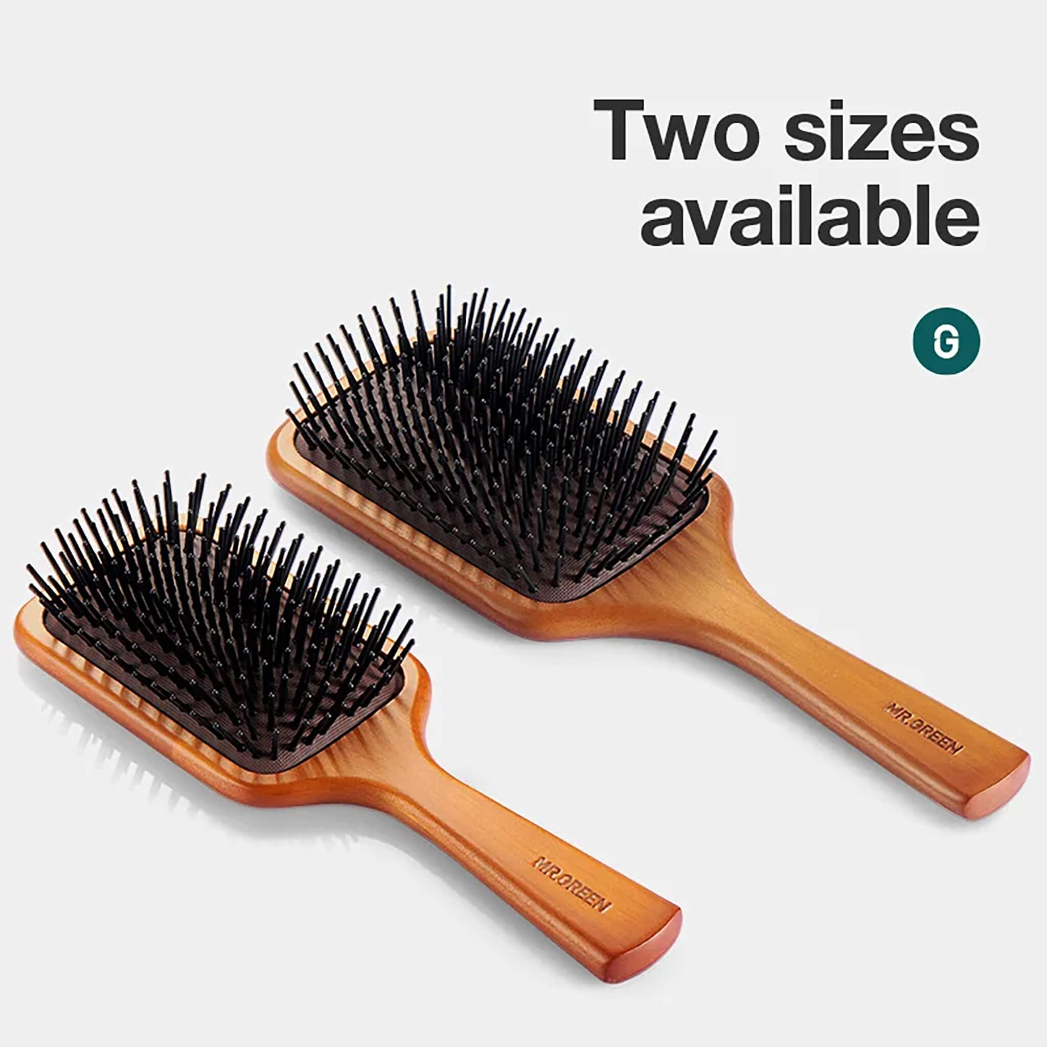 MR.GREEN paddle brush dome-tipped nylon pins on breathable cushion to reduce pulling, breakage, and frizz.