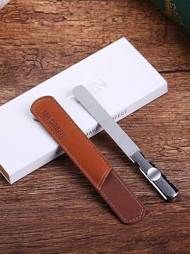 MR.GREEN double-sided stainless steel nail file with dual-grit surface and brown leather sleeve — professional manicure tool